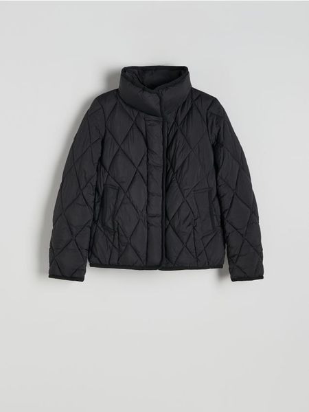 Pikowana kurtka z kołnierzem - czarny. Czarne kurtki damskie Reserved, l, bez wzorów, z tkaniny, bez kaptura. W wyprzedaży za 119.99 zł.