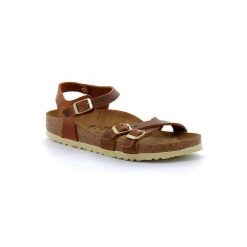 Klapki Birkenstock Kumba Brązowe Damskie. Brązowe klapki damskie Birkenstock, bez wzorów, z nubiku, bez obcasa, bez zapięcia. Za 874.00 zł.