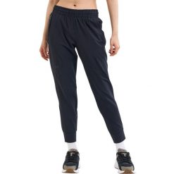 Spodnie sportowe damskie Under Armour Unstoppable Jogger. Czarne spodnie sportowe damskie Under Armour, l, bez wzorów, z dresówki, na fitness i siłownię. Za 537.00 zł.