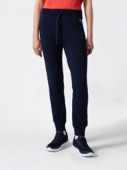 Champion Spodnie dresowe w kolorze granatowym rozmiar: XL. Niebieskie spodnie dresowe damskie Champion, xl, bez wzorów, z bawełny. Za 96.14 zł.