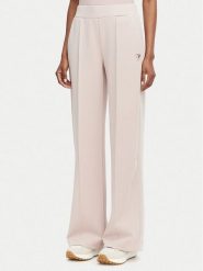 Guess Spodnie dresowe V6YB18 K4315 Różowy jasny Regular Fit. Czerwone spodnie dresowe damskie Guess, xl, z aplikacjami, z dresówki. Za 394.99 zł.
