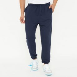 Spodnie sportowe unisex F BALLON niebieskie. Niebieskie obuwie sportowe damskie LEGEA, bez wzorów, z gumy, na fitness i siłownię. W wyprzedaży za 92.00 zł.