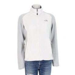 Second life - Kurtka polarowa TNF White dla kobiet - Stan bardzo dobry. Białe kurtki damskie The North Face, bez wzorów, z polaru, bez kaptura. Za 169.16 zł.