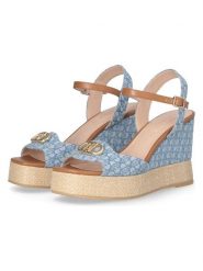 Liu Jo Sandały w kolorze błękitnym na koturnie rozmiar: 37. Niebieskie sandały damskie Liu Jo, bez wzorów, z materiału, z otwartym noskiem, bez obcasa, na koturnie, bez zapięcia. Za 305.92 zł.