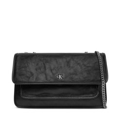Torebka Calvin Klein Jeans. Czarne torebki wieczorowe damskie Calvin Klein Jeans, bez wzorów, z jeansu, bez dodatków. Za 349.99 zł.