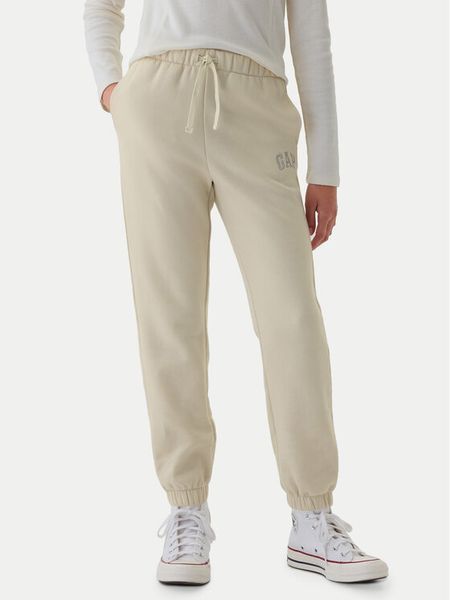 Gap Spodnie dresowe 486496-08 Beżowy Regular Fit. Brązowe spodnie dresowe dziewczęce GAP, bez wzorów, z bawełny. Za 79.99 zł.