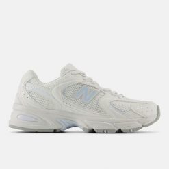 New Balance 530 U530CSD Sneakersy unisex. Białe obuwie sportowe damskie New Balance, z gumy, do biegania. Za 329.99 zł.