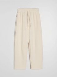 Dresowe spodnie barrel z dzianiny scuba - kremowy. Białe spodnie sportowe damskie Sinsay, l, bez wzorów, z dresówki. Za 49.99 zł.