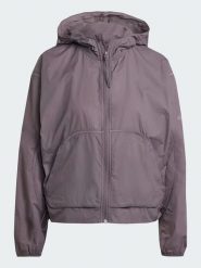 Adidas Kurtka przeciwwiatrowa w kolorze fioletowym rozmiar: S. Różowe kurtki sportowe damskie Adidas, s, bez wzorów, bez kaptura. Za 195.95 zł.