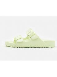 Birkenstock Klapki "Arizona" w kolorze żółtym rozmiar: 37. Żółte klapki damskie Birkenstock, bez wzorów, z otwartym noskiem, bez obcasa, bez zapięcia. Za 237.17 zł.