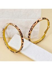 LA CHIQUITA Pozłacane kolczyki-kreole "My Leo" rozmiar: onesize. Żółte kolczyki damskie LA CHIQUITA, pozłacane. Za 96.45 zł.