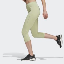 Legginsy damskie adidas 3/4 Own The Run Running. Zielone legginsy damskie Adidas, s, bez wzorów, z materiału. W wyprzedaży za 145.55 zł.