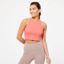 Koszulka bez rękawów damska Domyos Gym & Pilates 520 crop top. Brązowe koszulki damskie NYAMBA, xl, bez wzorów, z bawełny, bez kołnierzyka, bez ramiączek. W wyprzedaży za 29.99 zł.