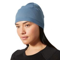 Czapka Helly Hansen Versalite. Niebieskie czapki damskie Helly Hansen, bez wzorów, z elastanu. Za 161.00 zł.