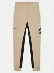 Guess Spodnie dresowe L4YQ12 KA6R4 Beżowy Regular Fit. Brązowe spodnie dresowe chłopięce Guess, z bawełny. Za 179.99 zł.