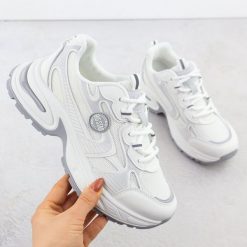 Półbuty damskie sportowe białe Big Star RR274A191. Białe obuwie sportowe casual damskie Big Star, z tkaniny, bez zapięcia. Za 259.99 zł.