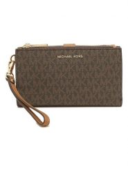 Michael Kors Portfel w kolorze ciemnobrązowym - 18 x 10 x 3 cm rozmiar: onesize. Brązowe portfele damskie Michael Kors, bez wzorów, z materiału. Za 506.32 zł.