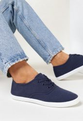 Granatowe Tenisówki z Krótkim Sznurowaniem Madilinne. Niebieskie obuwie sportowe damskie Born2be, z jeansu, bez zapięcia, tenisowe. Za 34.99 zł.
