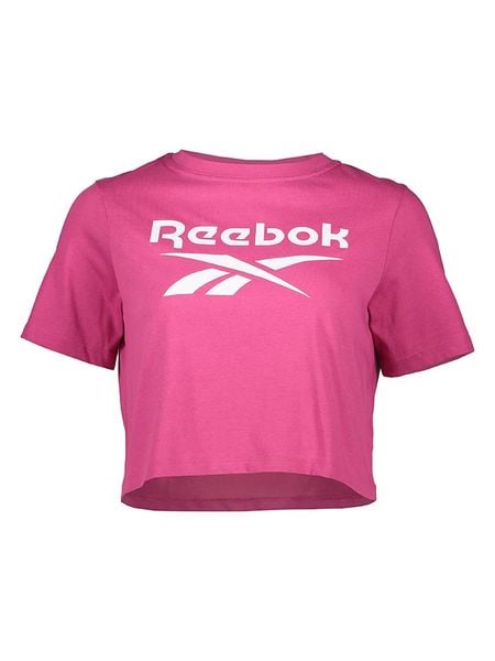 Reebok Koszulka w kolorze różowym rozmiar: S. Różowe bluzki damskie Reebok, s, bez wzorów, bez kołnierzyka, bez ramiączek. Za 52.42 zł.