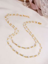 Pierres de Jade Pozłacany naszyjnik z elementami ozdobnymi - dł. 47 cm rozmiar: onesize. Białe naszyjniki damskie Pierres de Jade, z kamieniem księżycowym, pozłacane. Za 69.99 zł.