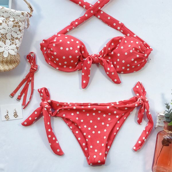 Bikini bez ramiączek w kropki na plażę i basen Phyliss. Czarne bikini Intica, bez wzorów. Za 129.00 zł.
