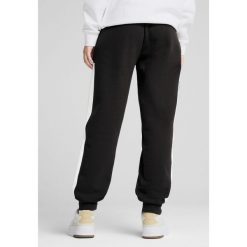Damskie spodnie dresowe Around The Block PUMA Black. Czarne spodnie dresowe damskie Puma, xs, bez wzorów, z dresówki. W wyprzedaży za 124.00 zł.