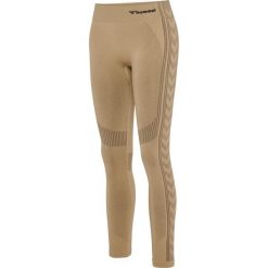 Damskie legginsy mid-rise Hummel Shaping. Brązowe legginsy damskie Hummel, m, bez wzorów, z materiału. Za 171.50 zł.