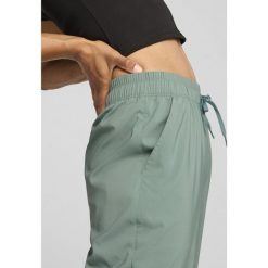 Damskie spodnie LACE PUMA Green Moon. Zielone spodnie sportowe damskie Puma, s, bez wzorów, z podwyższonym stanem, na jogę i pilates. W wyprzedaży za 210.05 zł.
