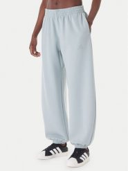 Adidas Spodnie dresowe Soft Lux KA7018 Zielony Loose Fit. Zielone spodnie dresowe damskie Adidas, l, bez wzorów, z dresówki. Za 329.99 zł.