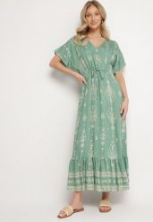 Zielona Sukienka Rozkloszowana z Wiskozą w Boho Wzór z Falbaną Turaline. Zielone sukienki damskie Born2be, bez wzorów, z wiskozy, boho, bez ramiączek. Za 99.99 zł.