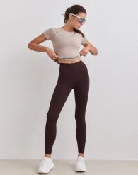 Damskie legginsy z wysokim stanem, squat proof, z kieszeniami Sense czekoladowe. Brązowe legginsy damskie Aim'n, xl, bez wzorów, z elastanu. Za 350.00 zł.