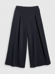 4F Spodnie dresowe z szerokimi nogawkami modalem damskie - czarne XL. Czarne spodnie dresowe damskie 4F, xl, bez wzorów, z dresówki. Za 189.99 zł.