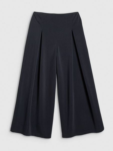 4F Spodnie dresowe z szerokimi nogawkami modalem damskie - czarne L. Czarne spodnie dresowe damskie 4F, l, bez wzorów, z dresówki. Za 189.99 zł.