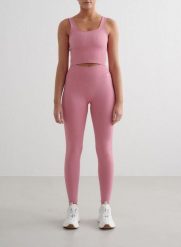 Damskie legginsy bezszwowe, prążkowane, wysoki stan, squat proof różowe. Czerwone legginsy damskie Aim'n, l, bez wzorów, z dzianiny. Za 152.40 zł.