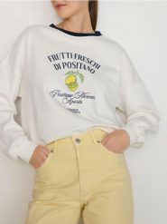 Bluza z nadrukiem - złamana biel. Bluzy damskie Reserved, l, bez wzorów, z bawełny, bez kaptura. W wyprzedaży za 99.99 zł.