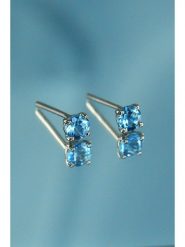 DIAMANTA Złote kolczyki-wkrętki "Single Topazes" z topazem rozmiar: onesize. Niebieskie kolczyki damskie DIAMANTA, z topazem, złote. Za 817.99 zł.