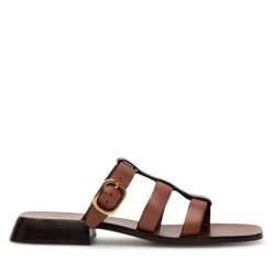 Klapki GINO ROSSI. Brązowe klapki damskie Gino Rossi, bez wzorów, bez obcasa, bez zapięcia. Za 259.99 zł.