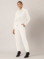 APART Spodnie w kolorze białym rozmiar: 42. Białe spodnie materiałowe damskie Apart, bez wzorów, z kaszmiru. Za 162.49 zł.