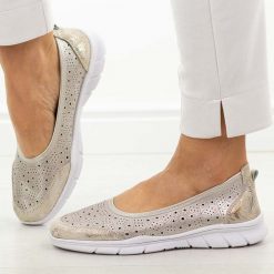 Szampańskie ażurowe skórzane baleriny damskie Jezzi 9997. Żółte balerinki damskie Jezzi, w ażurowe wzory, z jeansu, z okrągłym noskiem. Za 189.00 zł.