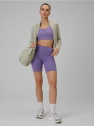 Legginsy krótkie treningowe z wysokim stanem bezszwowe damskie. Fioletowe legginsy damskie 4F, l, bez wzorów, z dzianiny. Za 99.99 zł.