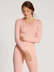 Calida Wełniana koszulka w kolorze koralowym rozmiar: M. Różowe koszulki damskie Calida, m, bez wzorów, z koronki, bez kołnierzyka, bez ramiączek. Za 214.19 zł.