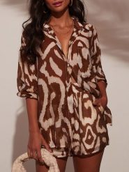 Milan Kiss Bluzka w kolorze brązowo-kremowym rozmiar: L. Brązowe bluzki damskie Milan Kiss, l, bez wzorów, bez kołnierzyka, bez ramiączek. Za 135.17 zł.