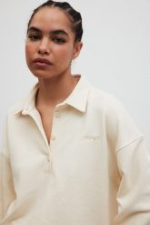 Bluza damska z kołnierzem w kolorze BUTTER YELLOW - EXPLORE-S/M. Żółte bluzy damskie Marsala, m, bez wzorów, z bawełny, bez kaptura. Za 339.90 zł.