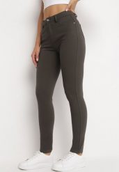 Ciemnozielone Spodnie o Fasonie Skinny Zapinane na Guzik i Suwak z Kieszeniami Zysuna. Zielone rurki damskie Born2be, bez wzorów, z jeansu. Za 64.99 zł.