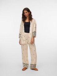 Vero Moda Spodnie w kolorze kremowo-czarnym rozmiar: M. Brązowe spodnie materiałowe damskie Vero Moda, bez wzorów, z materiału. Za 155.15 zł.