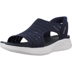 Sandały SKECHERS 119805S Niebieski. Niebieskie sandały damskie Skechers, bez wzorów, z materiału, bez obcasa, bez zapięcia. Za 269.99 zł.