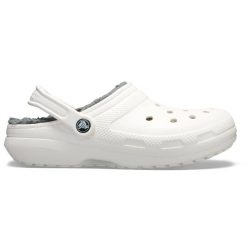 Klapki Crocs Model Classic Lined Clog Kolor Biały. Białe klapki damskie Crocs, bez wzorów, z gumy, bez obcasa, bez zapięcia. W wyprzedaży za 175.47 zł.