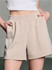 Szorty dresowe soft touch - beżowy. Brązowe spodenki sportowe damskie Sinsay, l, bez wzorów, z dresówki. W wyprzedaży za 24.99 zł.