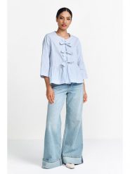 Rich & Royal Bluzka w kolorze błękitno-białym rozmiar: 38. Niebieskie bluzki damskie Rich & Royal, bez wzorów, z bawełny, bez kołnierzyka, bez ramiączek. Za 236.61 zł.