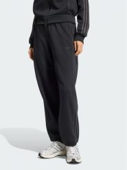 Adidas Spodnie dresowe 164782 Czarny Loose Fit. Czarne spodnie dresowe damskie Adidas, m, bez wzorów, z dresówki. Za 329.99 zł.